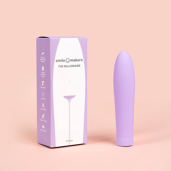 Vibrador The Billionaire junto a su empaque original de Smile Makers, diseño elegante y discreto en amani